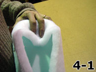 Hand Folding Dacron Over Corner of Foam